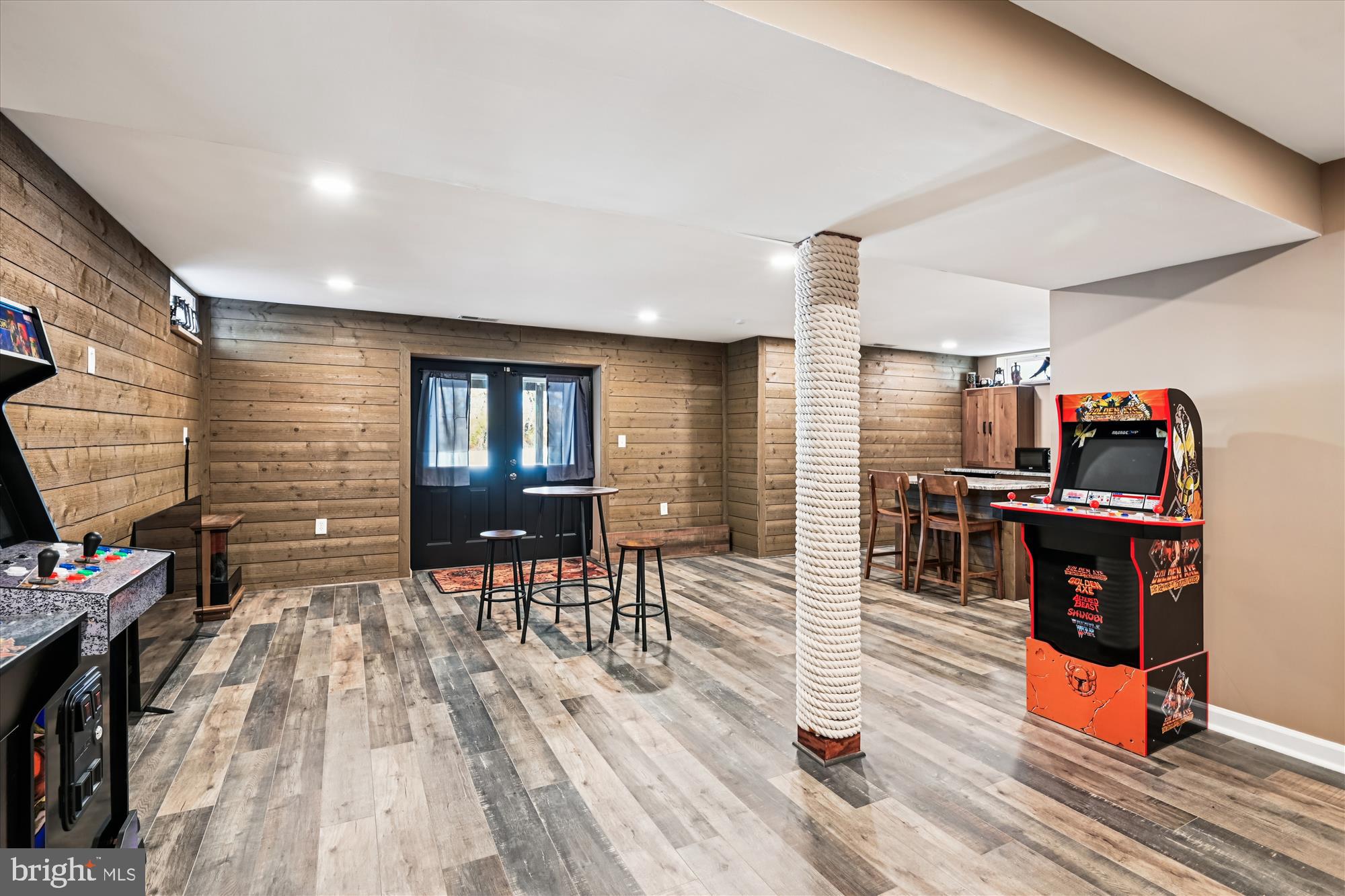 2310 228th Street Pasadena, MD 21122 - Photo 28 of 45 a living room with furniture and a wooden floor