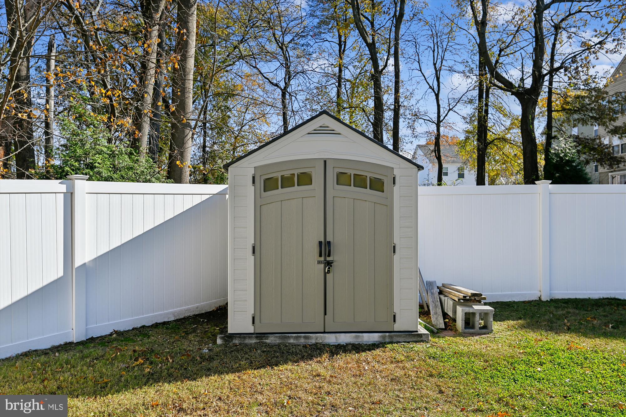 2310 228th Street Pasadena, MD 21122 - Photo 35 of 45 a front view of a house with garden