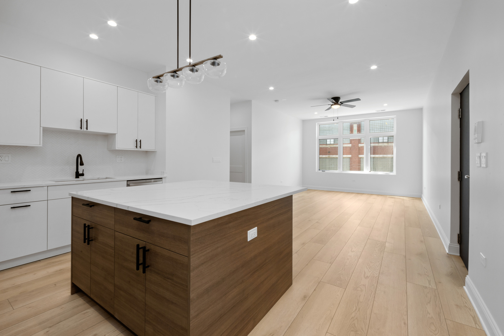 70 East Pershing Road, Unit 3E Chicago, IL 60653 - Photo 8 of 17 a kitchen with a stove and a refrigerator