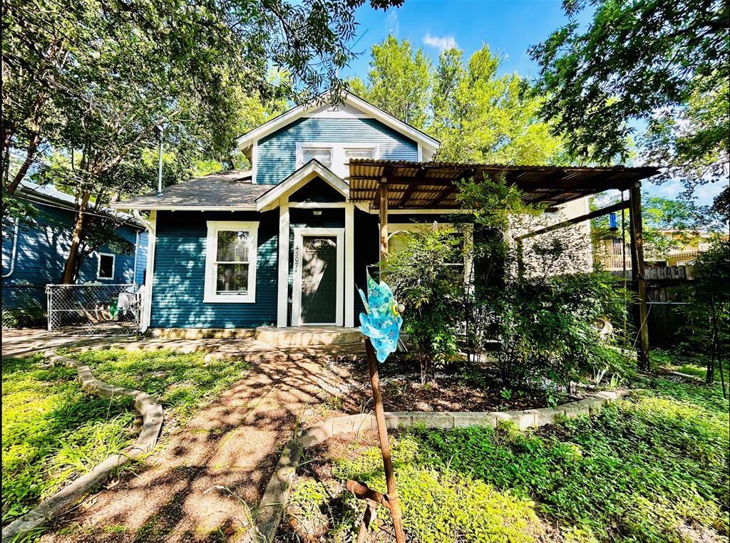 4507 Avenue F, Unit B Austin, TX 78751 - Photo 1 of 5 a front view of a house with a porch