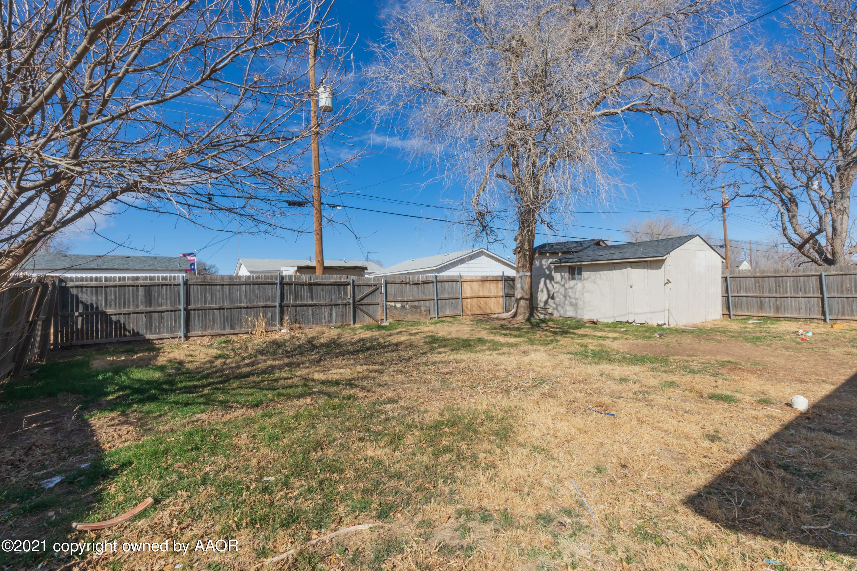 5102 South Travis Street Amarillo, TX 79110 - Photo 22 of 24 a view of a backyard