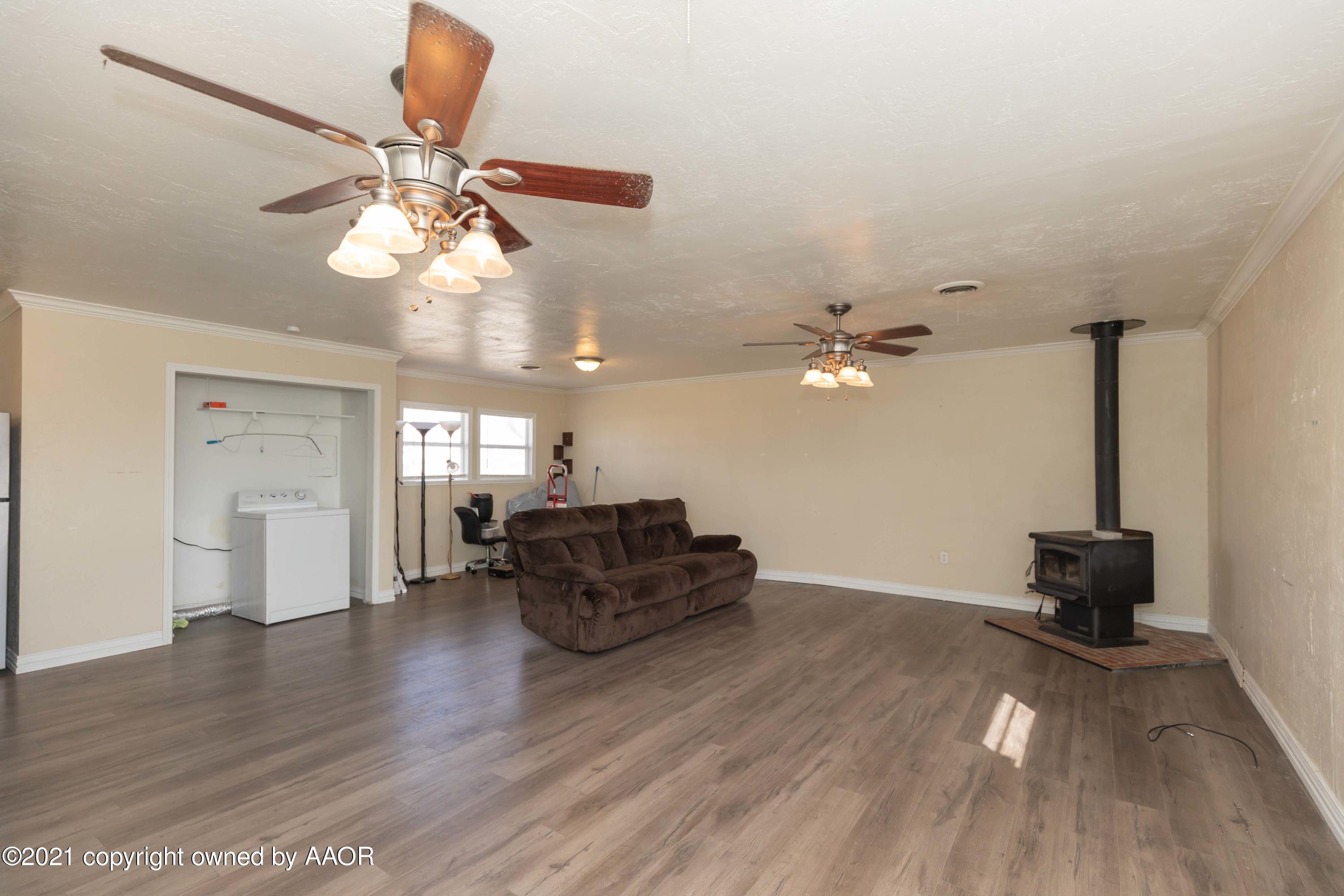 5102 South Travis Street Amarillo, TX 79110 - Photo 4 of 24 a view of livingroom with furniture and wooden floor