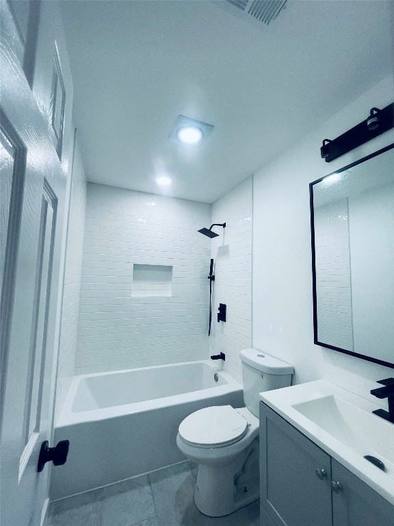 7107 Guadalupe Street, Unit C Austin, TX 78752 - Photo 7 of 7 a bathroom with a sink a toilet and shower
