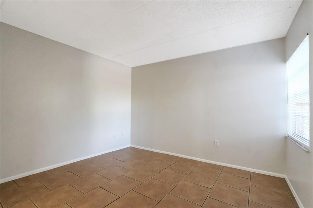1902 Honour Road, Unit 11 Orlando, FL 32839 - Photo 18 of 18 a view of an empty room