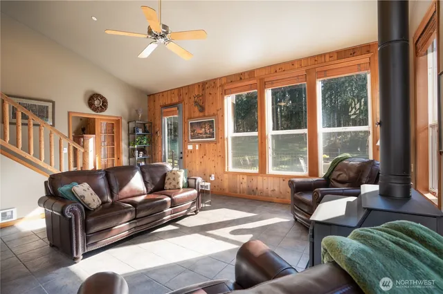 a kitchen with a sink cabinets and outdoor space