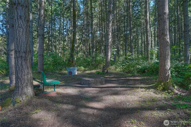 an aerial view of a house with outdoor space and street view