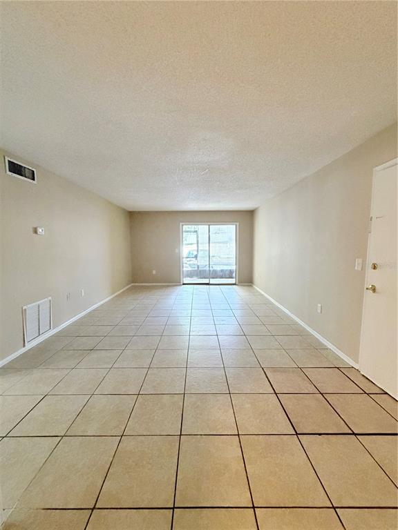 908 Lake Destiny Road, Unit B Altamonte Springs, FL 32714 - Photo 2 of 16 a view of an empty room with a window