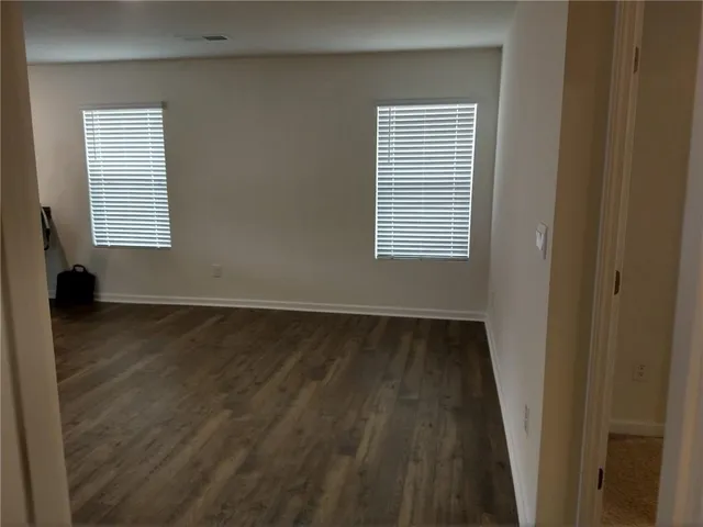 a view of a backyard of the house