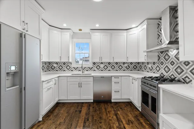 a spacious bathroom with a granite countertop sink toilet and shower