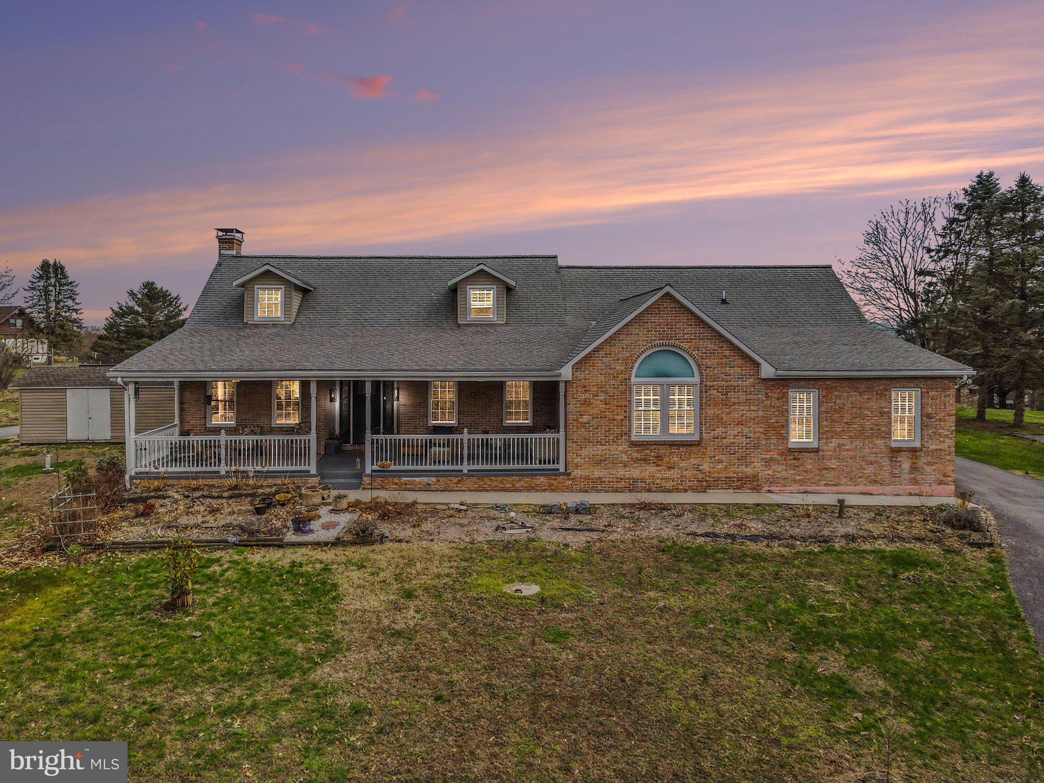 369 Dunkel School Road Halifax, PA 17032 - Photo 2 of 33 Charming brick home at sunset glow.