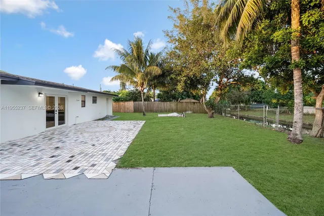 a view of a backyard with a garden