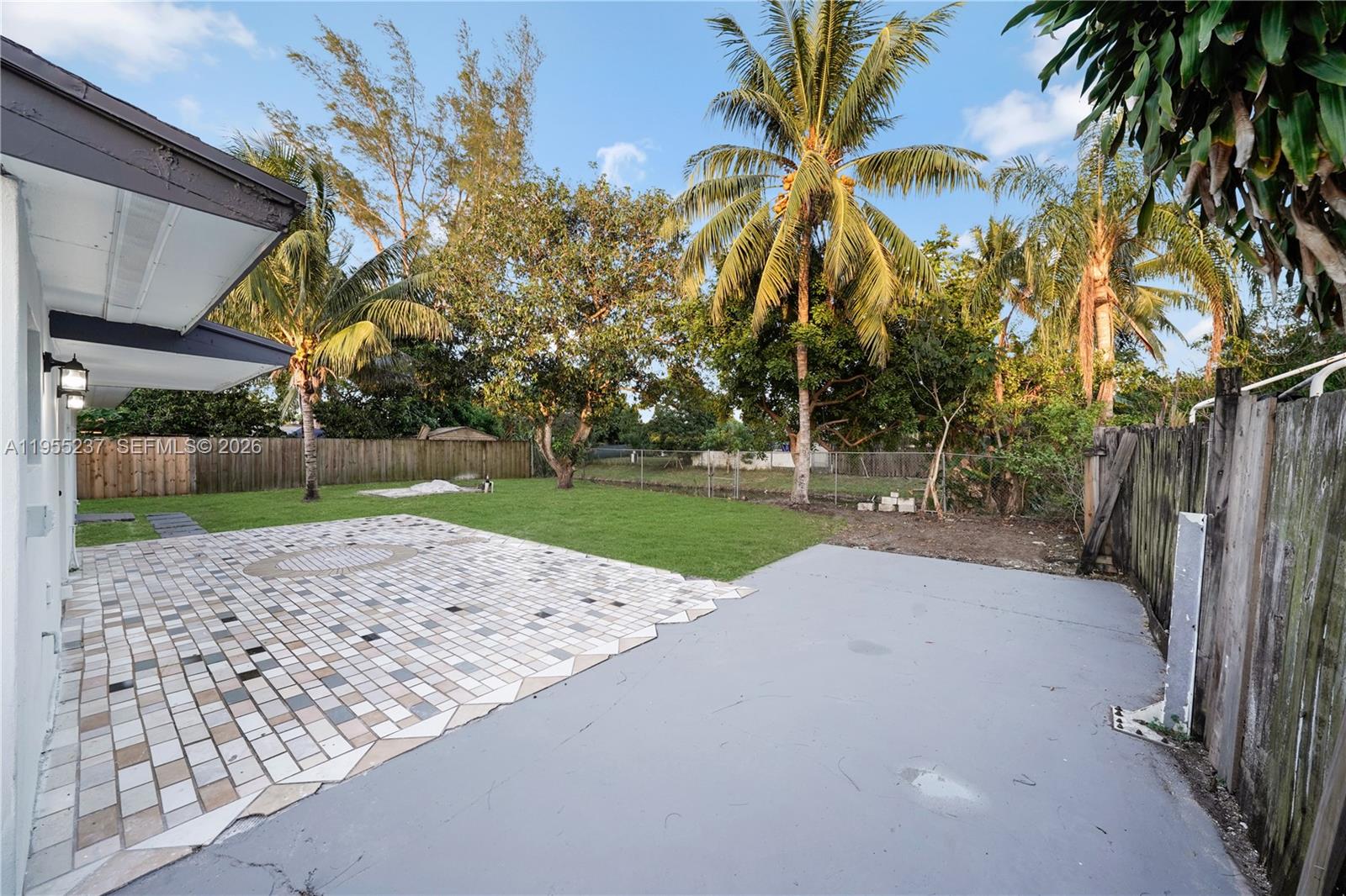 368 Southwest 64th Terrace Pompano Beach, FL 33068 - Photo 13 of 23 a view of a park with a palm tree
