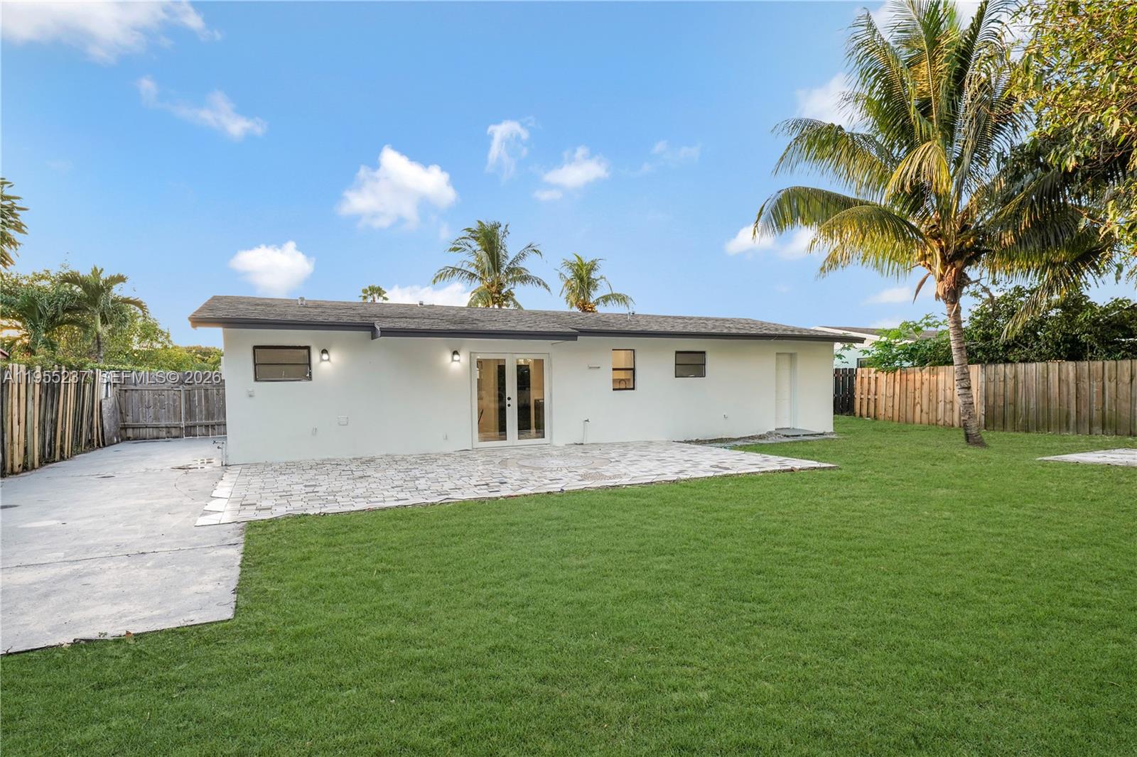 368 Southwest 64th Terrace Pompano Beach, FL 33068 - Photo 22 of 23 a view of a yard with a house