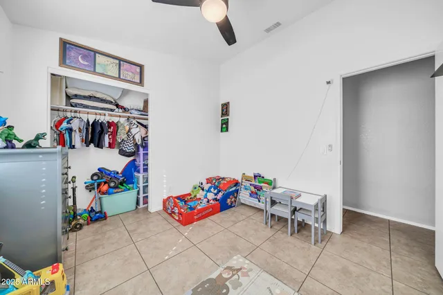 a children room with toys and a couch