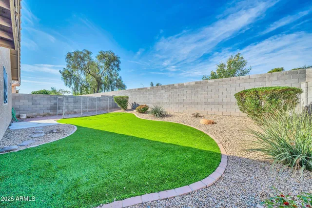 a view of a backyard with a garden