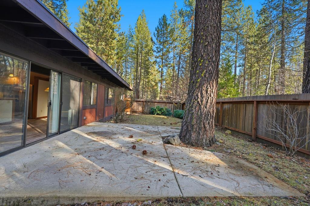 39 Graeagle Meadows Road, Unit 39 Graeagle, CA 96103 - Photo 44 of 48 a view of a backyard with a tree