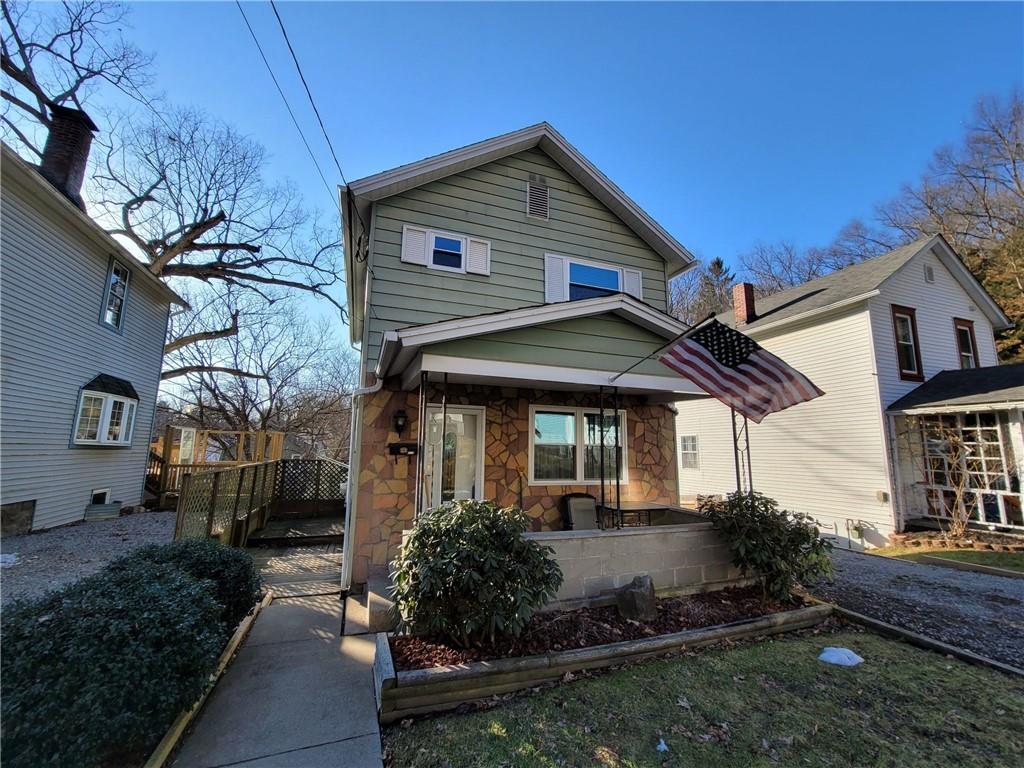 212 Summit Street Butler, PA 16001 - Photo 1 of 17 a front view of a house with garden