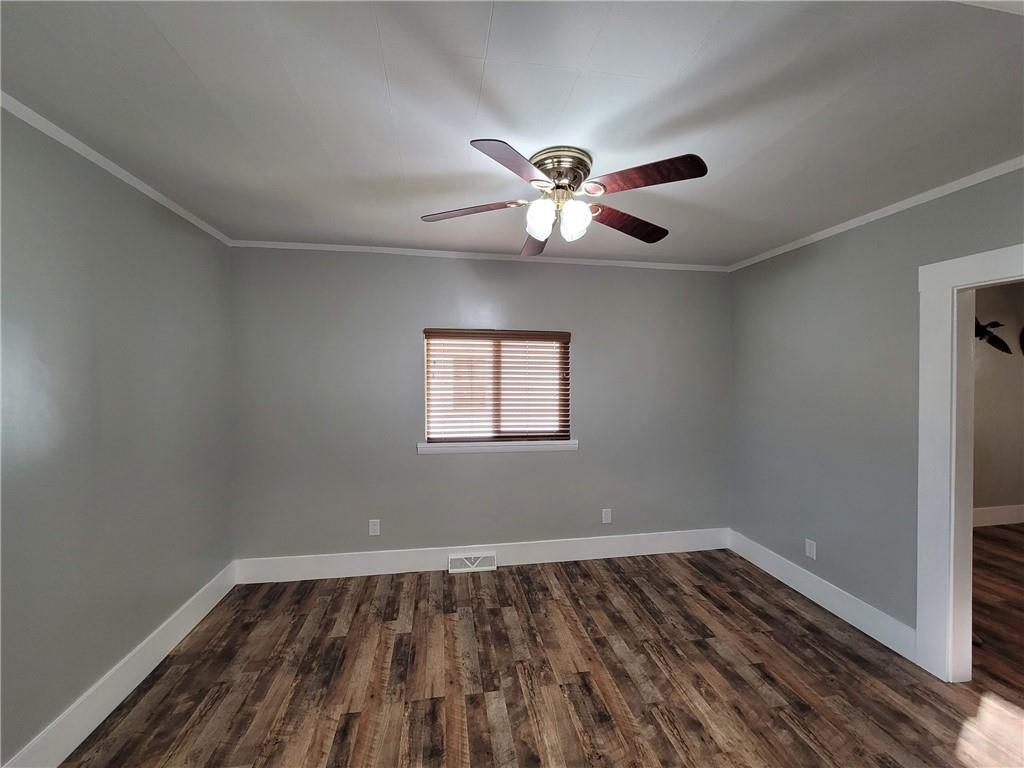 212 Summit Street Butler, PA 16001 - Photo 6 of 17 wooden floor in an empty room with a window