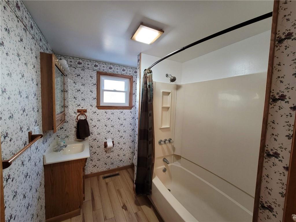 212 Summit Street Butler, PA 16001 - Photo 8 of 17 a bathroom with a bathtub and a shower