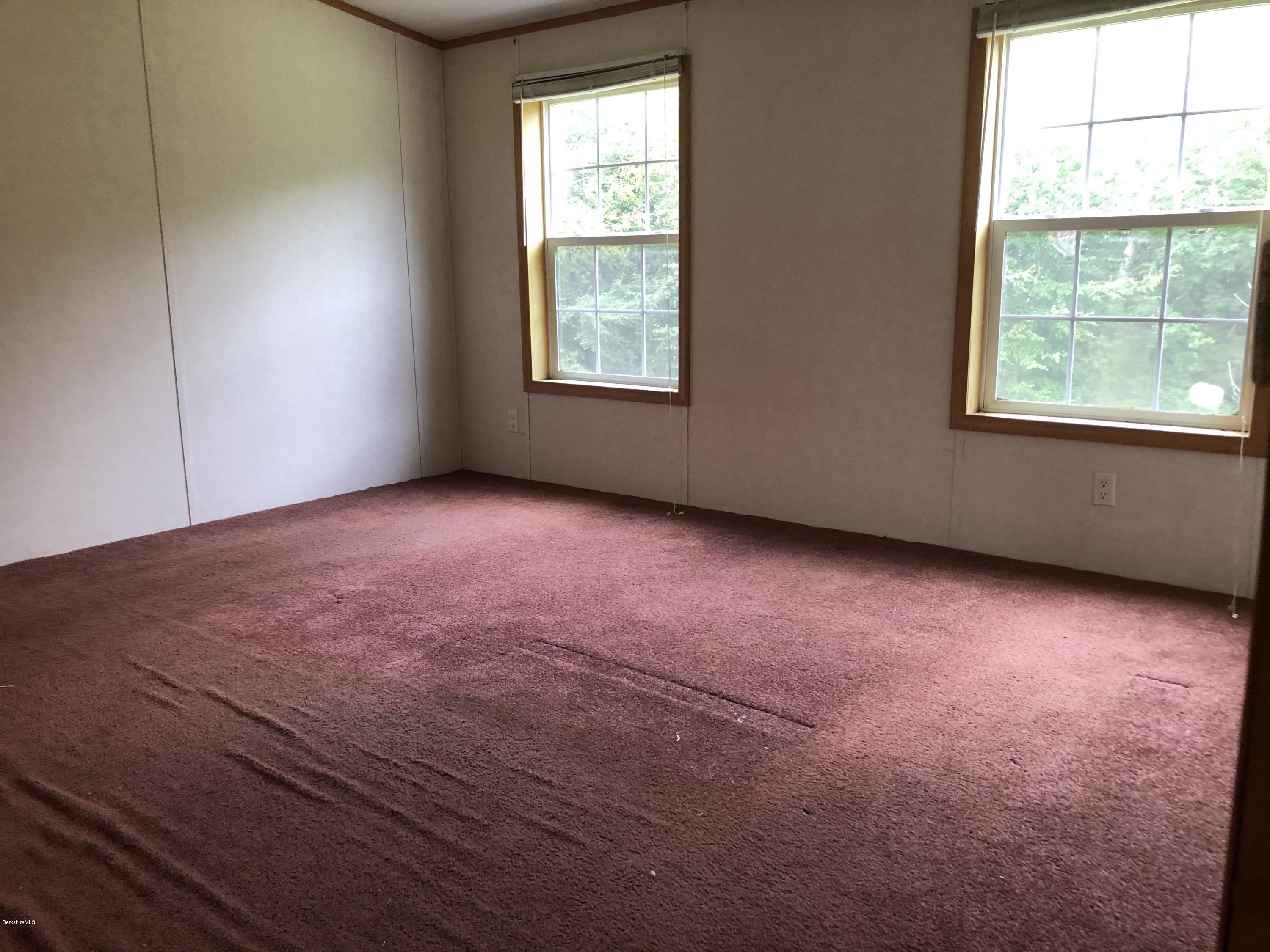 55 East Windsor Road Peru, MA 01235 - Photo 14 of 28 an empty room with a window