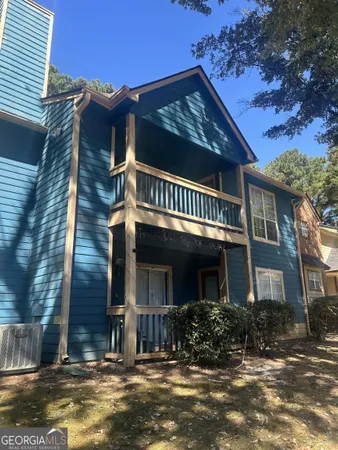a view of a house with a patio