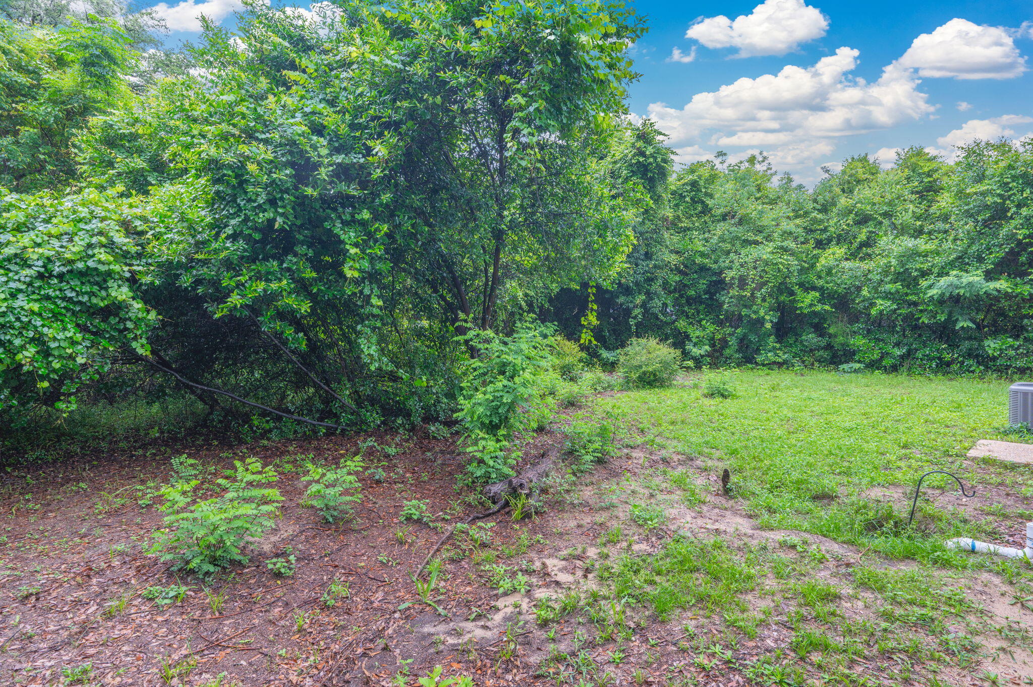 834 McDonald Street Crestview, FL 32536 - Photo 30 of 35 a view of a garden