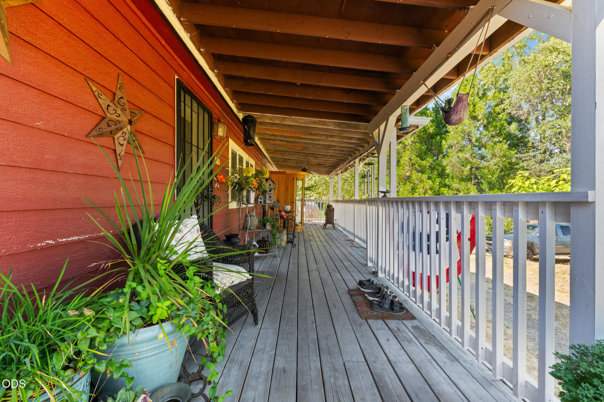 690 Foots Creek Road Gold Hill, OR 97525 - Photo 6 of 45 a balcony with wooden floor