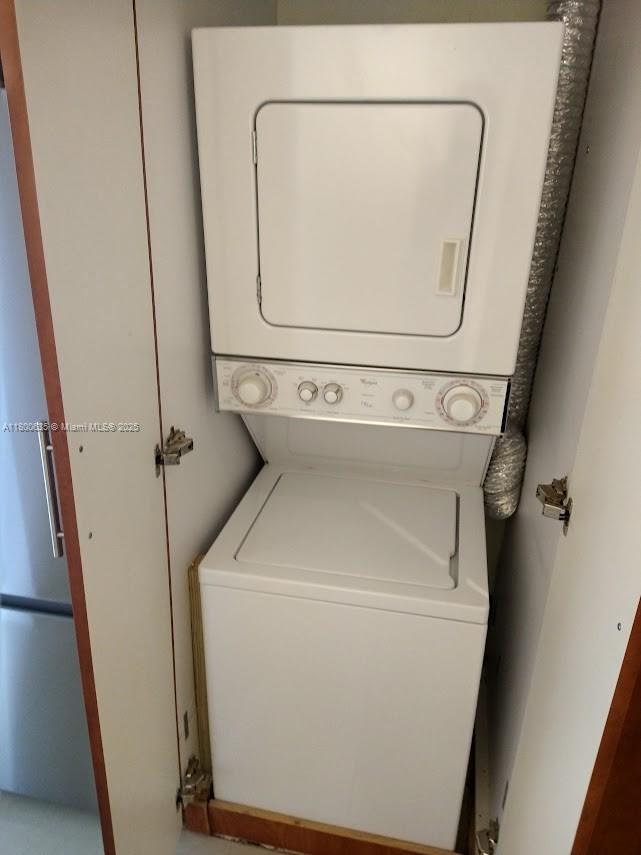 200 Southeast 15th Road, Unit 9B Miami, FL 33129 - Photo 22 of 39 a utility room with dryer and washer