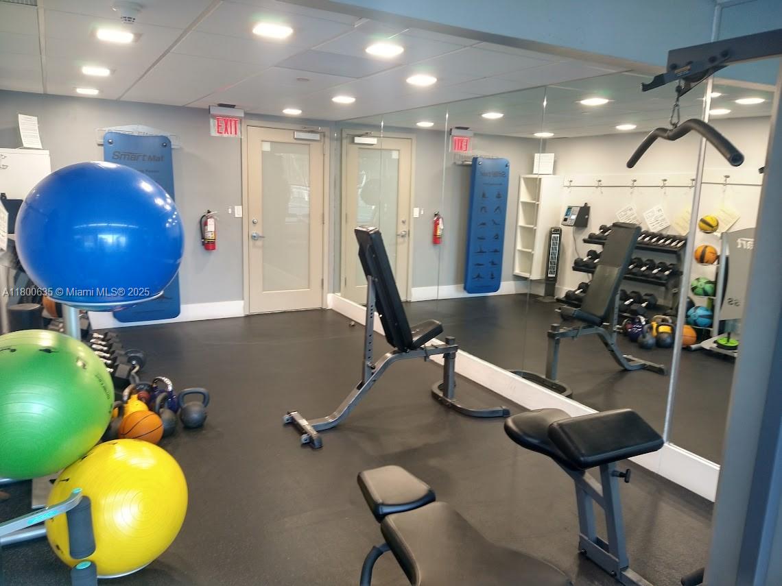 200 Southeast 15th Road, Unit 9B Miami, FL 33129 - Photo 33 of 39 a view of a room with gym equipment