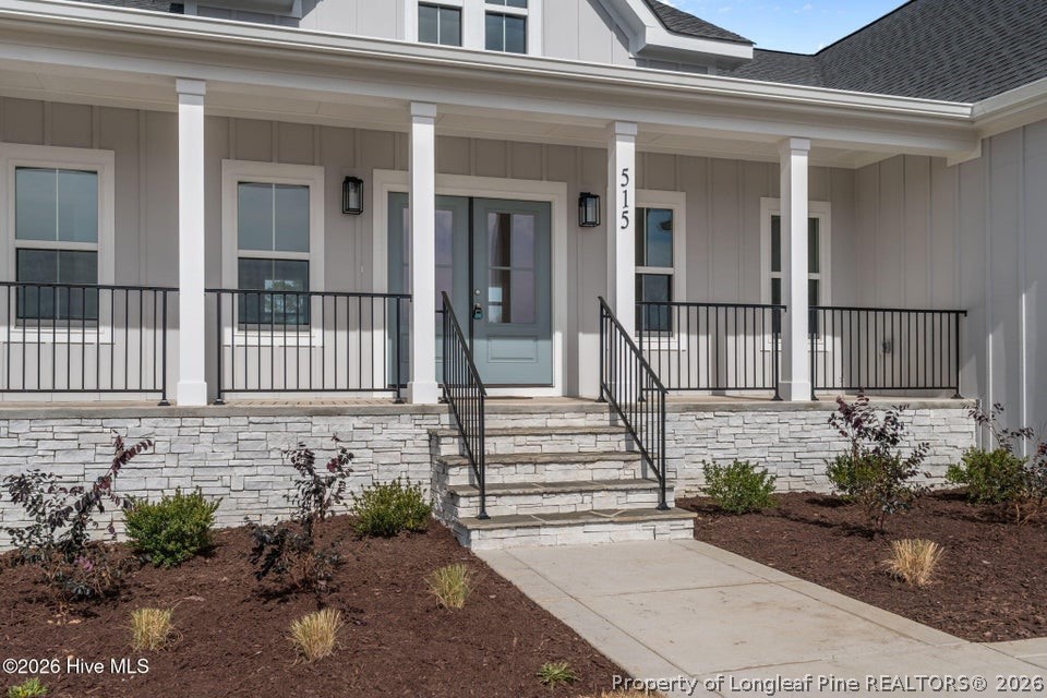 515 Sanctuary Trail Cameron, NC 28326 - Photo 12 of 46 front view of a house with a small yard