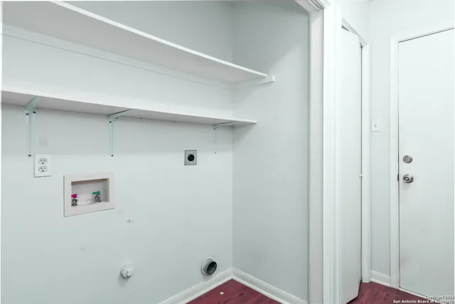 a bathroom with a shower and a shower