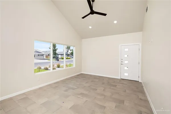 an empty room with windows