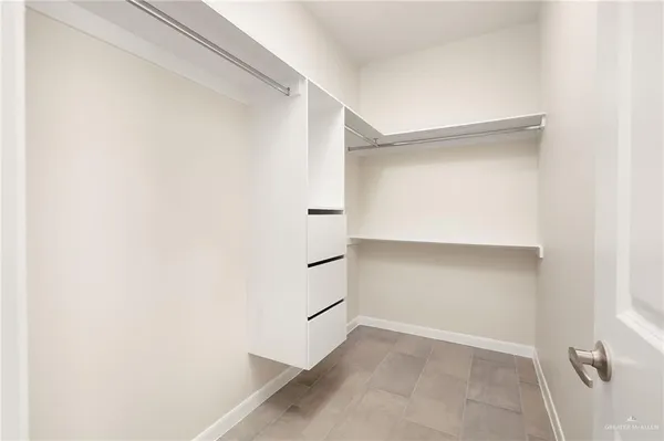 a view of an empty walk in closet
