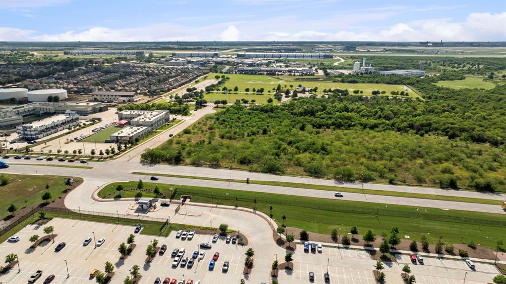 5200 North Belt Line Road Irving, TX 75038 - Photo 15 of 40 a view of a swimming pool with a yard