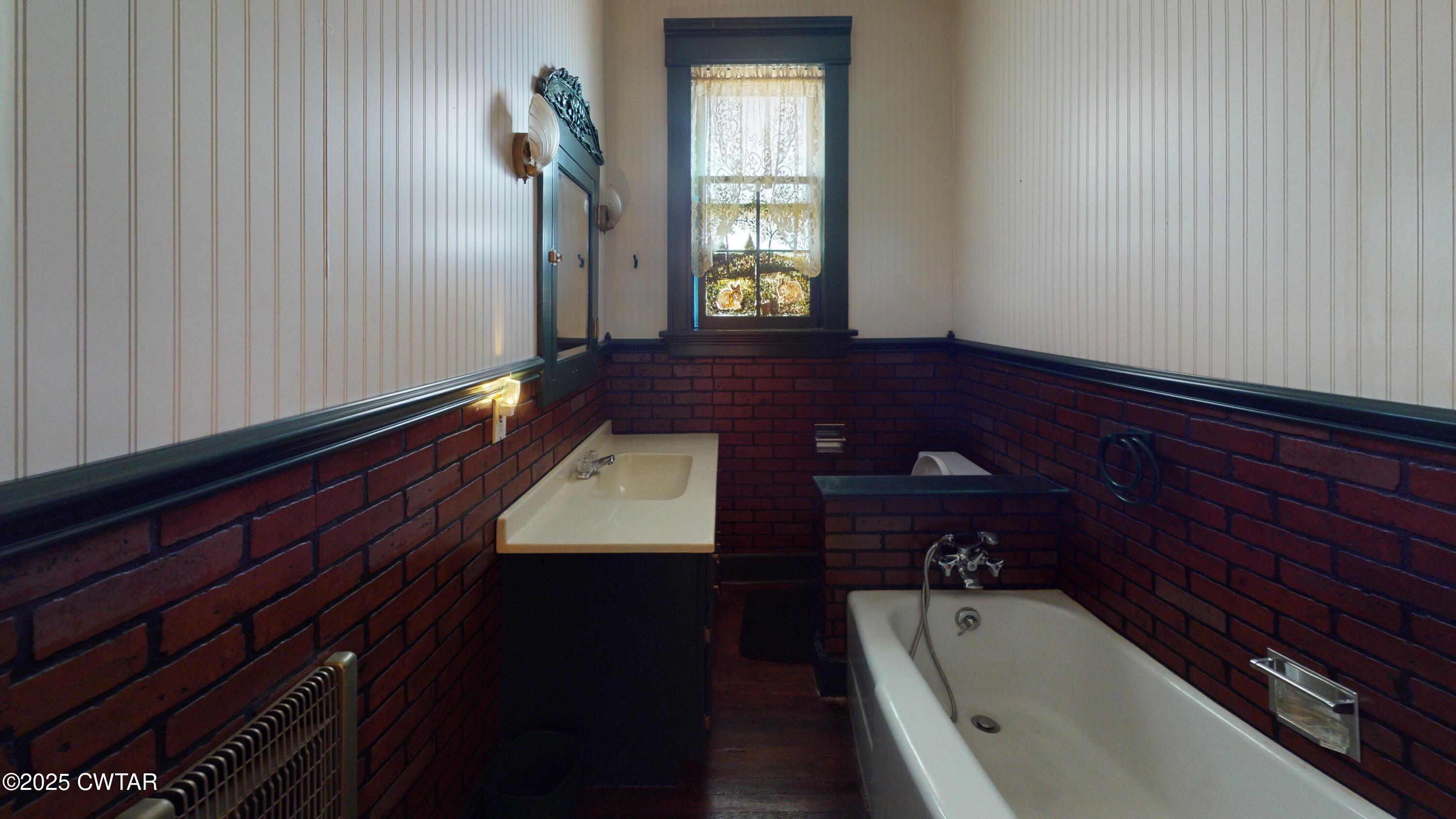 154 South Main Street Ripley, TN 38063 - Photo 19 of 40 a view of balcony with furniture