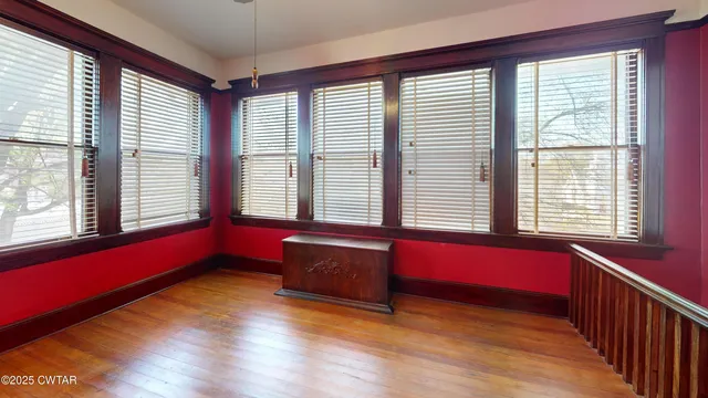 a view of a kitchen with furniture and window