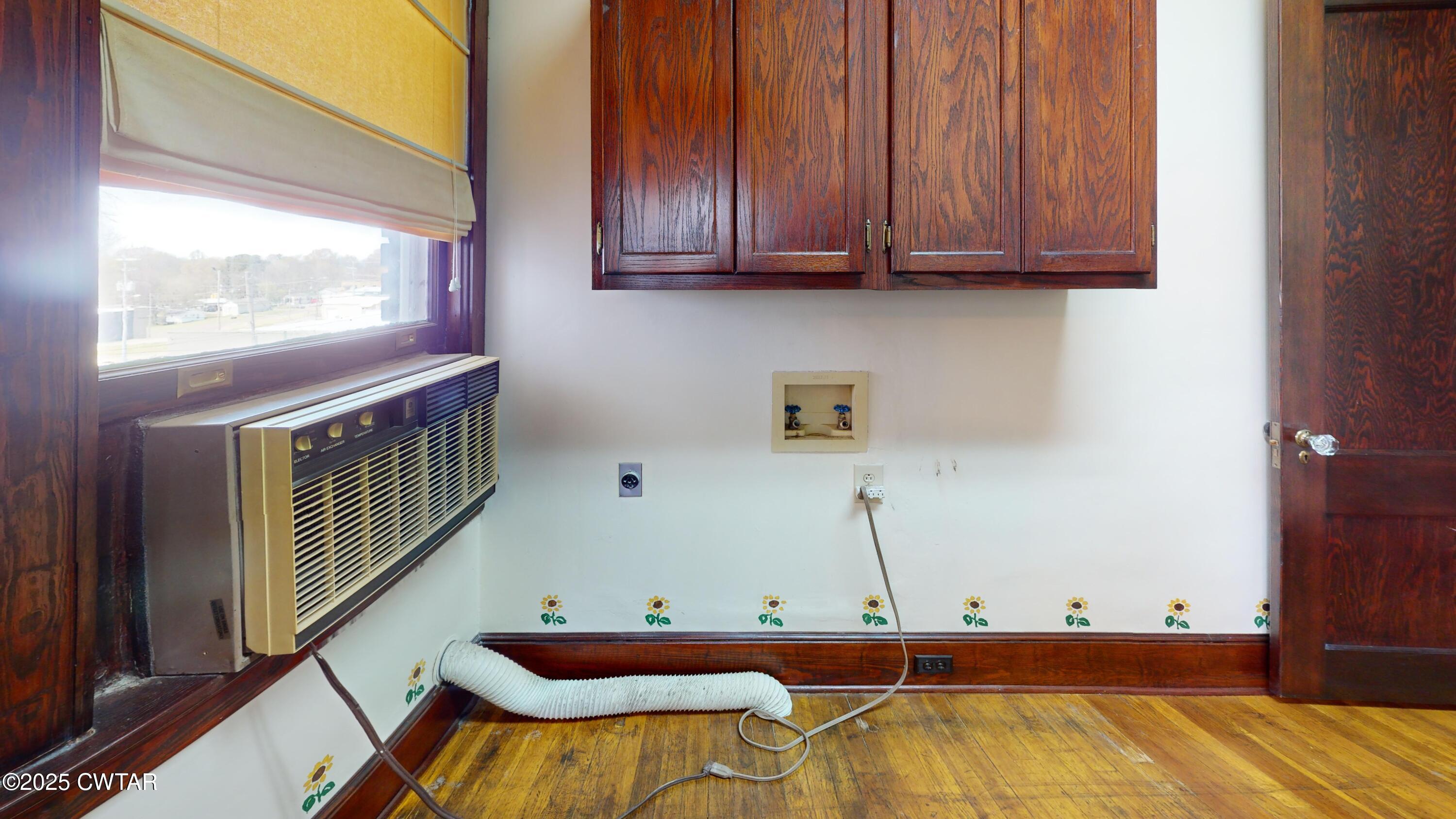 154 South Main Street Ripley, TN 38063 - Photo 30 of 40 a view of a kitchen with furniture and window
