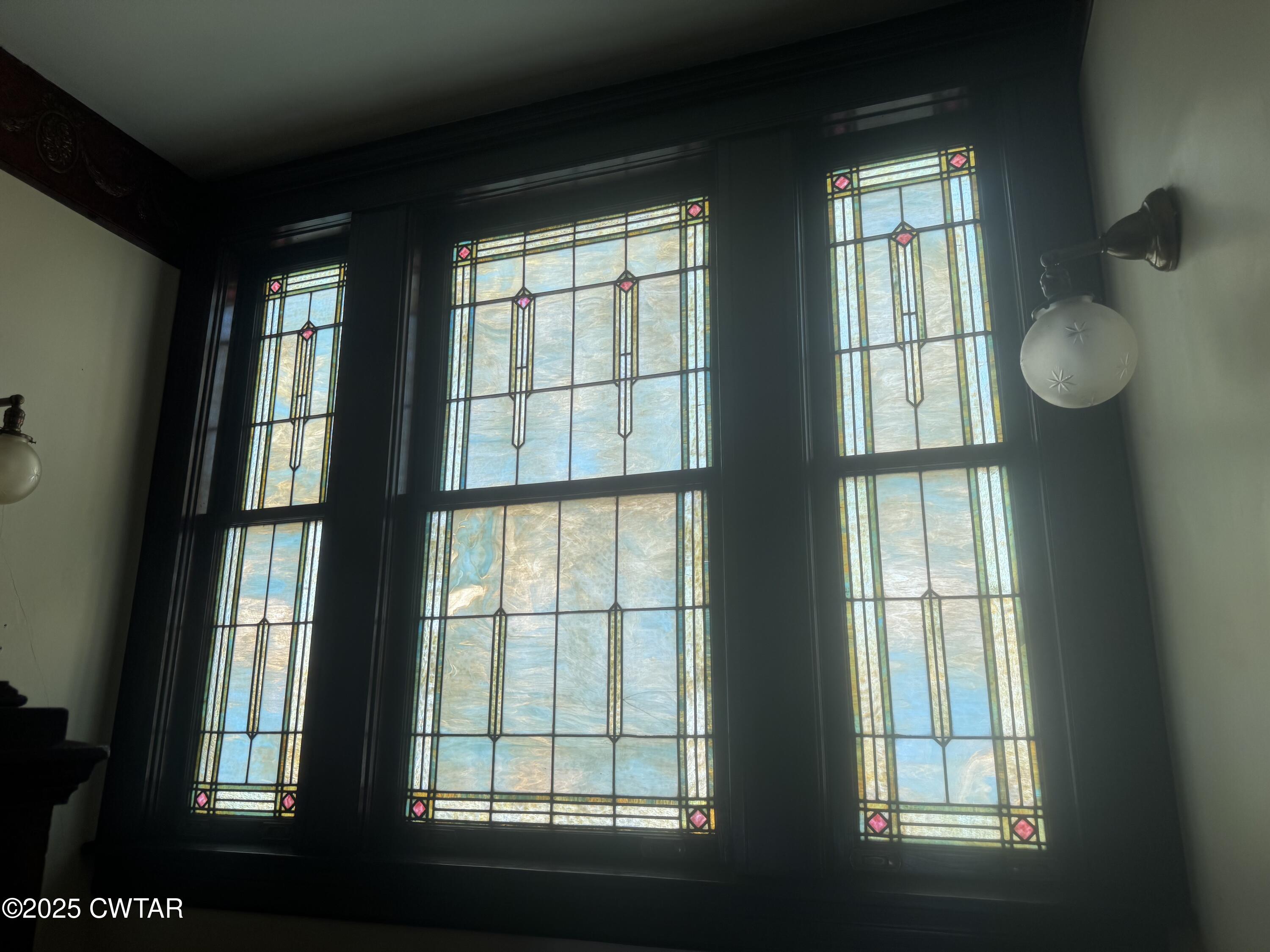 154 South Main Street Ripley, TN 38063 - Photo 36 of 40 an empty room with windows