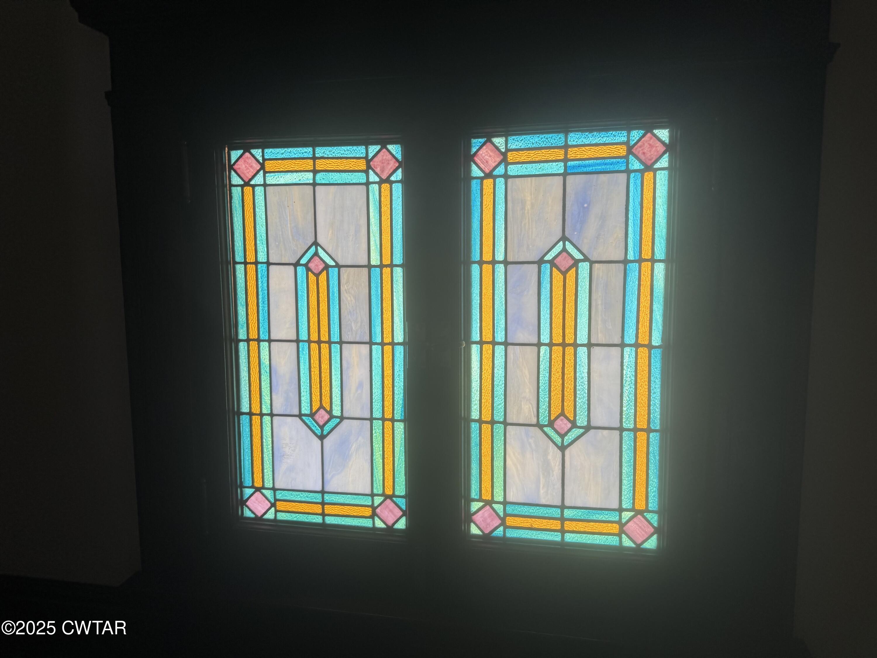 154 South Main Street Ripley, TN 38063 - Photo 37 of 40 a view of an empty room with windows and a table