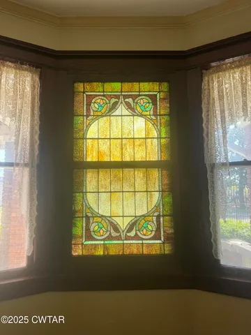a vase of flowers sitting on a table
