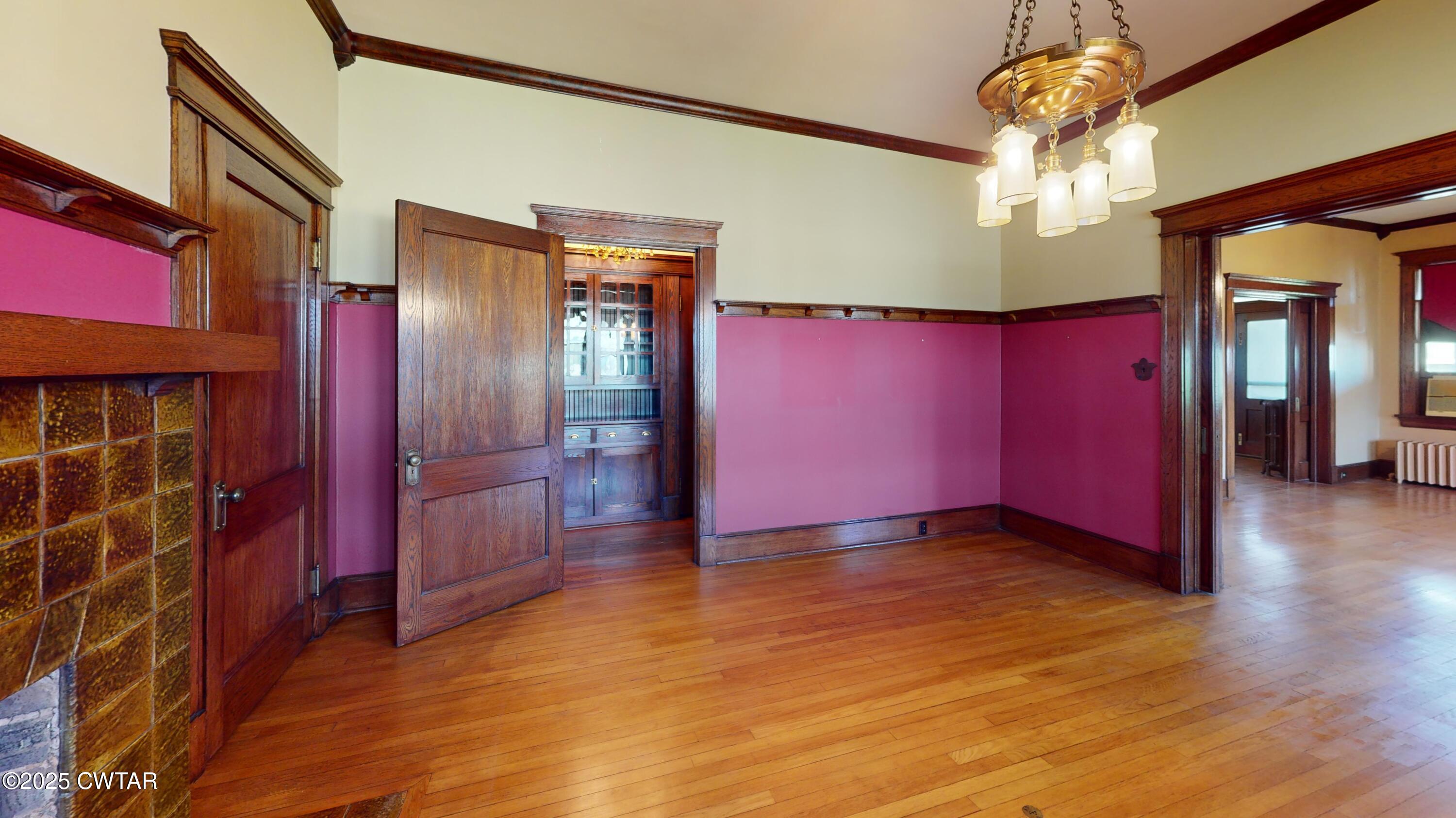 154 South Main Street Ripley, TN 38063 - Photo 6 of 40 a view of a room with wooden floor