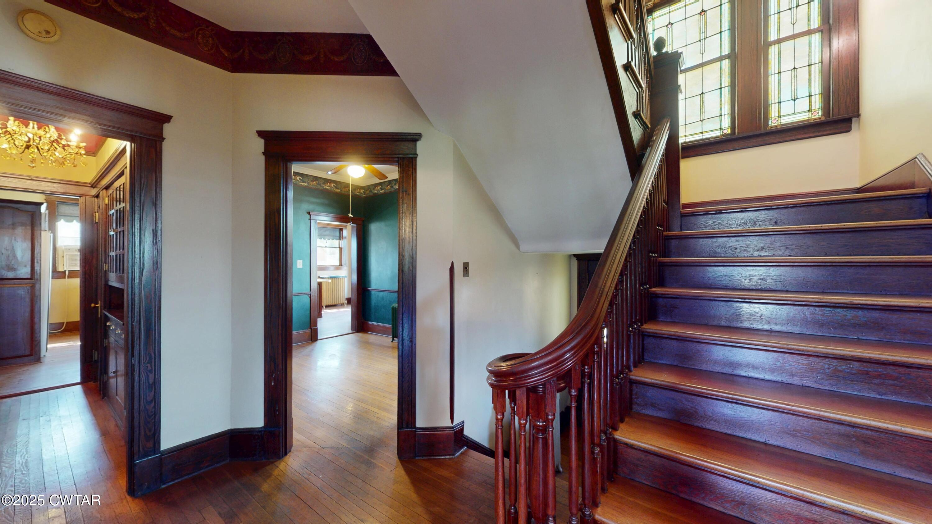154 South Main Street Ripley, TN 38063 - Photo 10 of 40 a view of entryway and hall with wooden floor