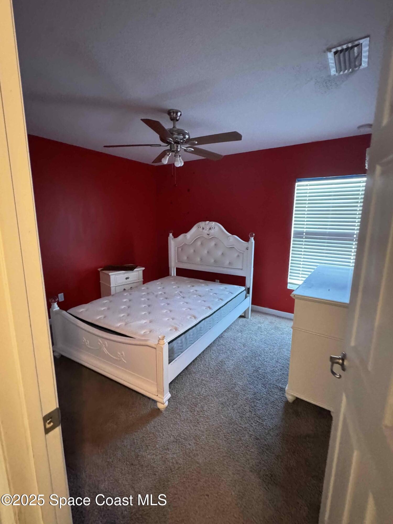 3925 Southwest Laffite Street Port St. Lucie, FL 34953 - Photo 11 of 20 a living room with furniture and a rug
