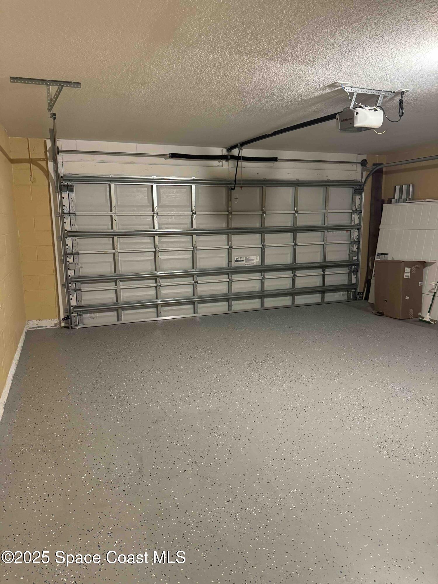 3925 Southwest Laffite Street Port St. Lucie, FL 34953 - Photo 4 of 20 a view of a garage