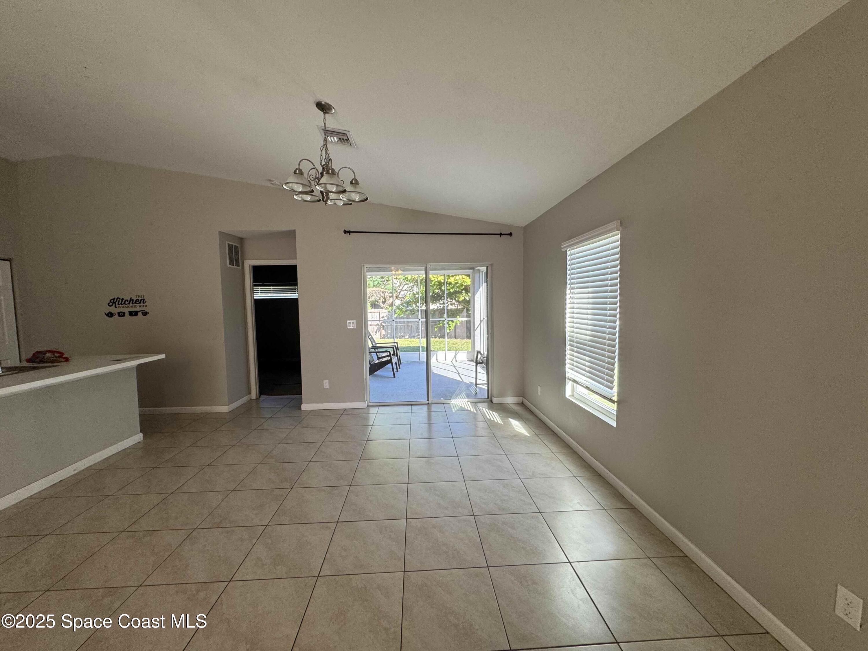 3925 Southwest Laffite Street Port St. Lucie, FL 34953 - Photo 8 of 20 a view of an empty room with a window