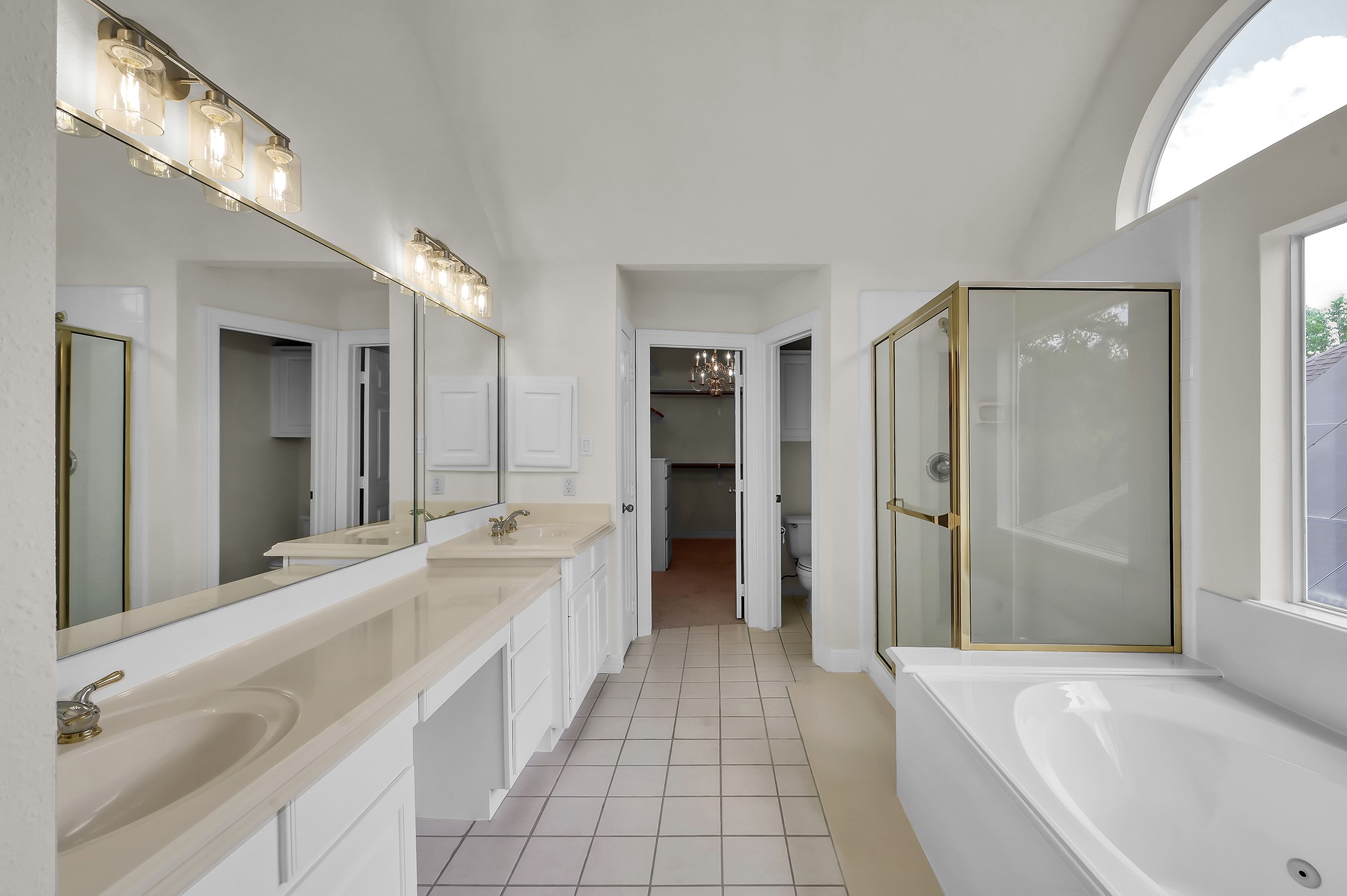 18310 Rittenhouse Park Court Spring, TX 77379 - Photo 18 of 35 Primary bathroom boasting double sinks, large tub and separate shower.