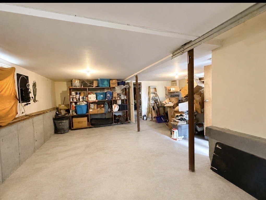439 Newport Road Hull, MA 02045 - Photo 15 of 19 a view of a livingroom with closet and furniture