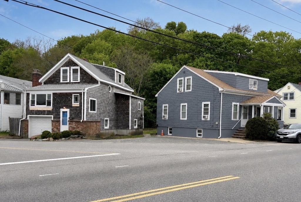 439 Newport Road Hull, MA 02045 - Photo 18 of 19 a front view of a house with a garden