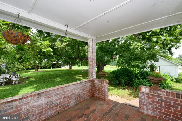 a house view with a garden space