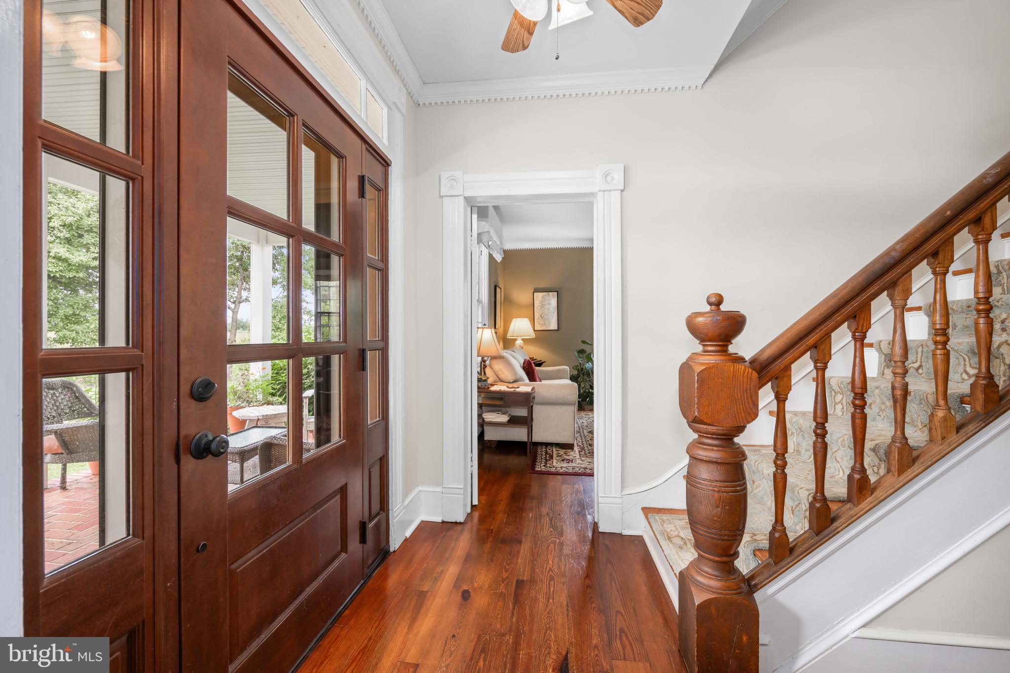 13699 Still Pond Road Still Pond, MD 21667 - Photo 22 of 55 a view of a hallway with wooden floor and staircase